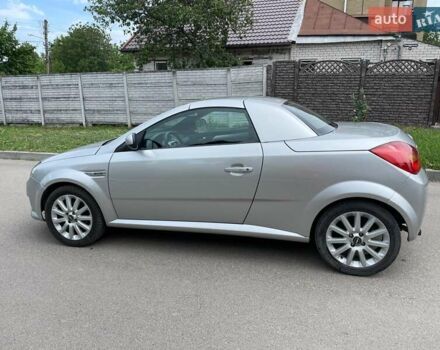 Серый Опель Тигра, объемом двигателя 1.3 л и пробегом 162 тыс. км за 4000 $, фото 6 на Automoto.ua