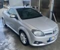 Сірий Опель Тігра, об'ємом двигуна 1.8 л та пробігом 220 тис. км за 4799 $, фото 2 на Automoto.ua