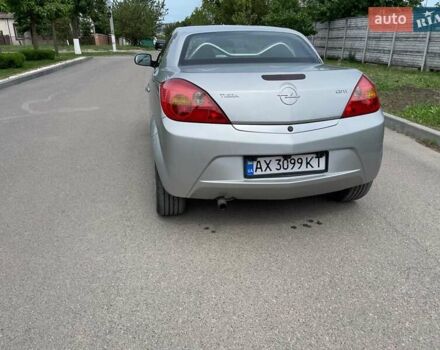 Серый Опель Тигра, объемом двигателя 1.3 л и пробегом 162 тыс. км за 4000 $, фото 5 на Automoto.ua