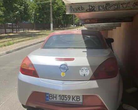 Сірий Опель Тігра, об'ємом двигуна 1.36 л та пробігом 150 тис. км за 2950 $, фото 1 на Automoto.ua