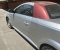 Сірий Опель Тігра, об'ємом двигуна 1.36 л та пробігом 150 тис. км за 2950 $, фото 2 на Automoto.ua