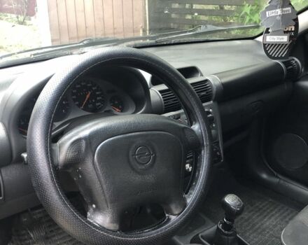 Серый Опель Тигра, объемом двигателя 1.4 л и пробегом 2 тыс. км за 2100 $, фото 6 на Automoto.ua