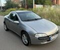 Серый Опель Тигра, объемом двигателя 1.4 л и пробегом 200 тыс. км за 2306 $, фото 1 на Automoto.ua
