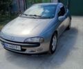 Серый Опель Тигра, объемом двигателя 1.39 л и пробегом 296 тыс. км за 1850 $, фото 1 на Automoto.ua