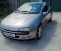 Сірий Опель Тігра, об'ємом двигуна 1.39 л та пробігом 296 тис. км за 1850 $, фото 1 на Automoto.ua