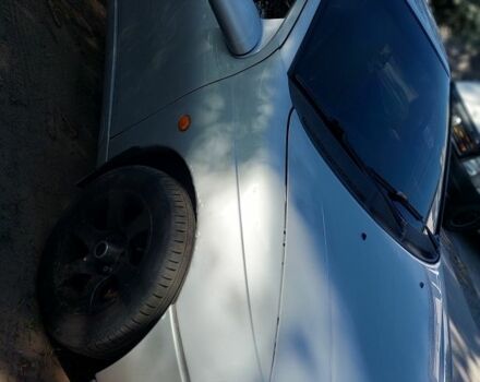 Серый Опель Тигра, объемом двигателя 1.6 л и пробегом 158 тыс. км за 2600 $, фото 2 на Automoto.ua