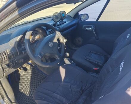 Сірий Опель Тігра, об'ємом двигуна 1.4 л та пробігом 240 тис. км за 2500 $, фото 5 на Automoto.ua