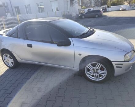 Сірий Опель Тігра, об'ємом двигуна 1.4 л та пробігом 240 тис. км за 2500 $, фото 1 на Automoto.ua