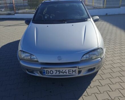 Сірий Опель Тігра, об'ємом двигуна 1.4 л та пробігом 240 тис. км за 2500 $, фото 2 на Automoto.ua