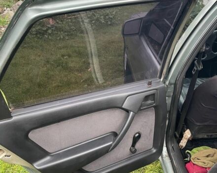 Сірий Опель Тігра, об'ємом двигуна 1.6 л та пробігом 326 тис. км за 1500 $, фото 7 на Automoto.ua