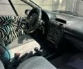 Серый Опель Тигра, объемом двигателя 5 л и пробегом 59 тыс. км за 2800 $, фото 4 на Automoto.ua