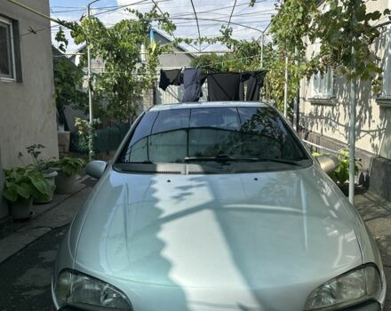 Серый Опель Тигра, объемом двигателя 1.4 л и пробегом 188 тыс. км за 2200 $, фото 1 на Automoto.ua