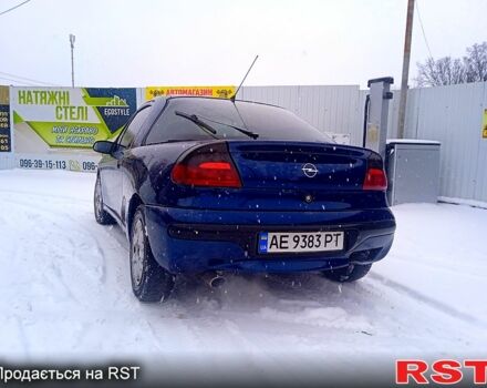 Синий Опель Тигра, объемом двигателя 14 л и пробегом 300 тыс. км за 2100 $, фото 3 на Automoto.ua