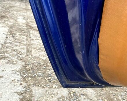 Синий Опель Тигра, объемом двигателя 1.4 л и пробегом 241 тыс. км за 3000 $, фото 11 на Automoto.ua