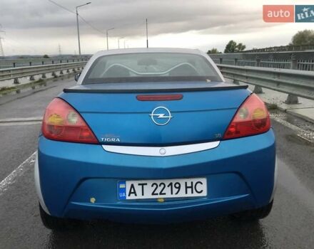 Синій Опель Тігра, об'ємом двигуна 1.8 л та пробігом 215 тис. км за 4999 $, фото 6 на Automoto.ua