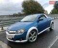 Синій Опель Тігра, об'ємом двигуна 1.8 л та пробігом 215 тис. км за 4999 $, фото 1 на Automoto.ua
