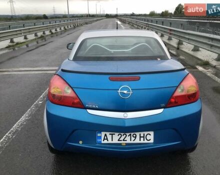 Синій Опель Тігра, об'ємом двигуна 1.8 л та пробігом 215 тис. км за 4999 $, фото 4 на Automoto.ua