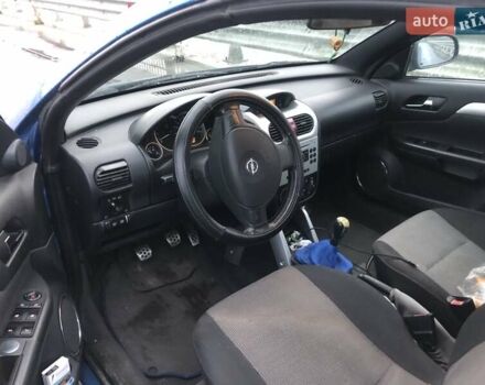 Синій Опель Тігра, об'ємом двигуна 1.8 л та пробігом 215 тис. км за 4999 $, фото 2 на Automoto.ua
