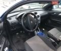 Синій Опель Тігра, об'ємом двигуна 1.8 л та пробігом 215 тис. км за 4999 $, фото 2 на Automoto.ua