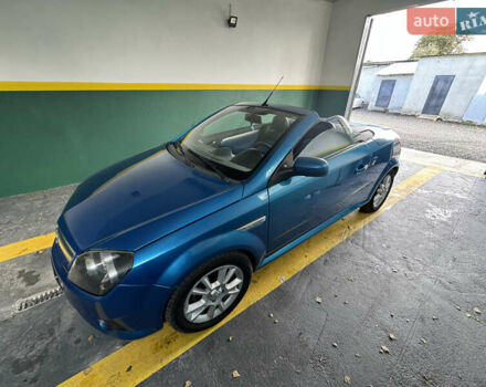 Синий Опель Тигра, объемом двигателя 1.39 л и пробегом 200 тыс. км за 4300 $, фото 13 на Automoto.ua