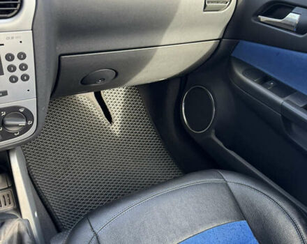 Синий Опель Тигра, объемом двигателя 1.39 л и пробегом 200 тыс. км за 4300 $, фото 29 на Automoto.ua