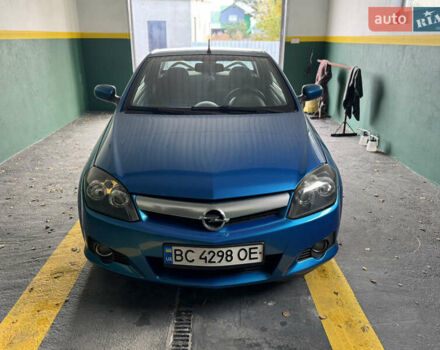 Синий Опель Тигра, объемом двигателя 1.39 л и пробегом 200 тыс. км за 4300 $, фото 2 на Automoto.ua