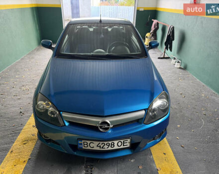 Синий Опель Тигра, объемом двигателя 1.39 л и пробегом 200 тыс. км за 4300 $, фото 10 на Automoto.ua