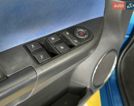 Синий Опель Тигра, объемом двигателя 1.39 л и пробегом 200 тыс. км за 4300 $, фото 21 на Automoto.ua