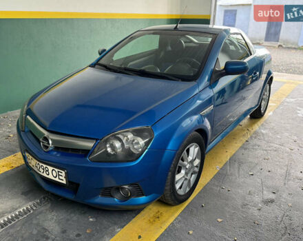 Синий Опель Тигра, объемом двигателя 1.39 л и пробегом 200 тыс. км за 4300 $, фото 4 на Automoto.ua