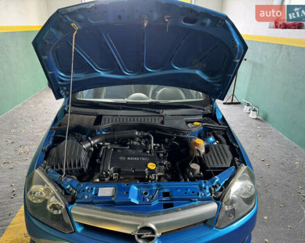 Синий Опель Тигра, объемом двигателя 1.39 л и пробегом 200 тыс. км за 4300 $, фото 26 на Automoto.ua