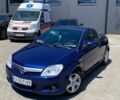 Синий Опель Тигра, объемом двигателя 1.8 л и пробегом 189 тыс. км за 4800 $, фото 1 на Automoto.ua