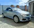 Синий Опель Тигра, объемом двигателя 1.2 л и пробегом 215 тыс. км за 4038 $, фото 1 на Automoto.ua