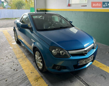 Синий Опель Тигра, объемом двигателя 1.39 л и пробегом 200 тыс. км за 4300 $, фото 1 на Automoto.ua