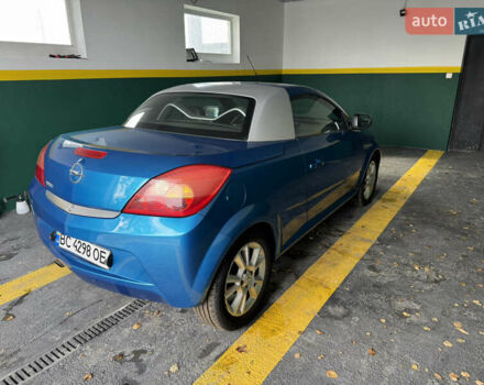 Синий Опель Тигра, объемом двигателя 1.39 л и пробегом 200 тыс. км за 4300 $, фото 5 на Automoto.ua