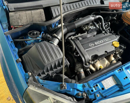 Синий Опель Тигра, объемом двигателя 1.39 л и пробегом 200 тыс. км за 4300 $, фото 22 на Automoto.ua