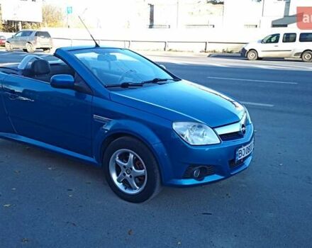 Синий Опель Тигра, объемом двигателя 1.3 л и пробегом 215 тыс. км за 5700 $, фото 11 на Automoto.ua
