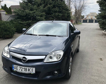 Синий Опель Тигра, объемом двигателя 1.3 л и пробегом 236 тыс. км за 4100 $, фото 6 на Automoto.ua