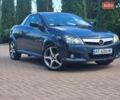 Синий Опель Тигра, объемом двигателя 1.36 л и пробегом 161 тыс. км за 3500 $, фото 1 на Automoto.ua