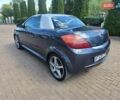 Синий Опель Тигра, объемом двигателя 1.36 л и пробегом 160 тыс. км за 3200 $, фото 1 на Automoto.ua