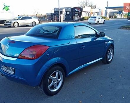 Синий Опель Тигра, объемом двигателя 1.3 л и пробегом 215 тыс. км за 5700 $, фото 5 на Automoto.ua