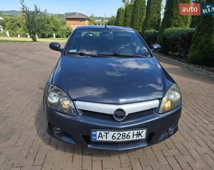 Синий Опель Тигра, объемом двигателя 1.36 л и пробегом 160 тыс. км за 3200 $, фото 6 на Automoto.ua