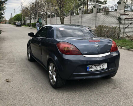 Синий Опель Тигра, объемом двигателя 1.3 л и пробегом 236 тыс. км за 4100 $, фото 9 на Automoto.ua