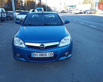 Синий Опель Тигра, объемом двигателя 1.3 л и пробегом 215 тыс. км за 5700 $, фото 2 на Automoto.ua