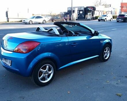 Синий Опель Тигра, объемом двигателя 1.3 л и пробегом 215 тыс. км за 5700 $, фото 13 на Automoto.ua