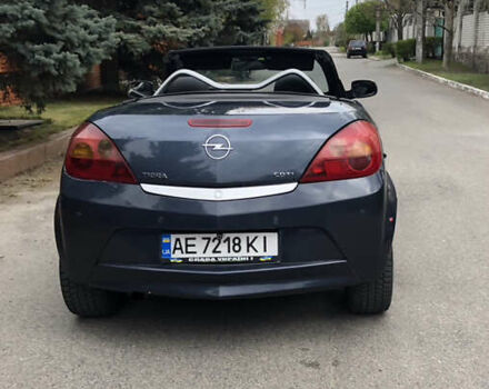 Синий Опель Тигра, объемом двигателя 1.3 л и пробегом 236 тыс. км за 4100 $, фото 3 на Automoto.ua