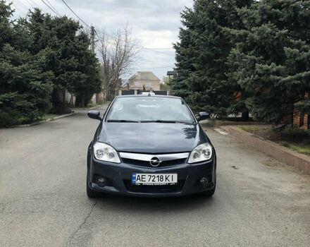 Синий Опель Тигра, объемом двигателя 1.3 л и пробегом 236 тыс. км за 4100 $, фото 5 на Automoto.ua