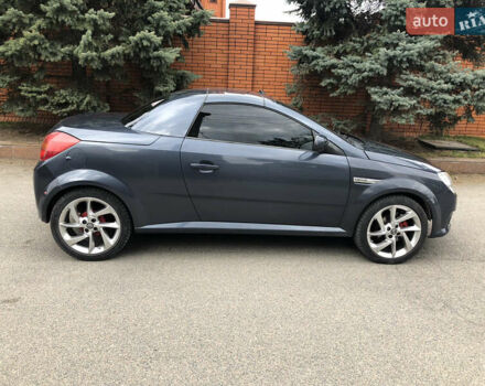 Синий Опель Тигра, объемом двигателя 1.3 л и пробегом 236 тыс. км за 4100 $, фото 10 на Automoto.ua