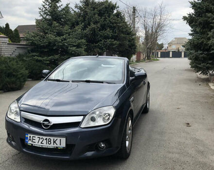 Синий Опель Тигра, объемом двигателя 1.3 л и пробегом 236 тыс. км за 4100 $, фото 4 на Automoto.ua