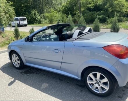 Синий Опель Тигра, объемом двигателя 1.4 л и пробегом 215 тыс. км за 4000 $, фото 6 на Automoto.ua