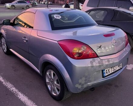 Синий Опель Тигра, объемом двигателя 1.4 л и пробегом 215 тыс. км за 4000 $, фото 2 на Automoto.ua